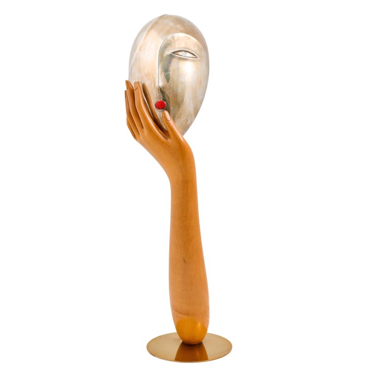 Female Mask resting on a hand Franz Hagenauer Werkstätte Hagenauer Wien ca. 1960 brass chased enamelled carved wood polished marked